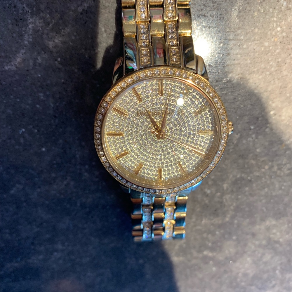 Michael kore watch in gold